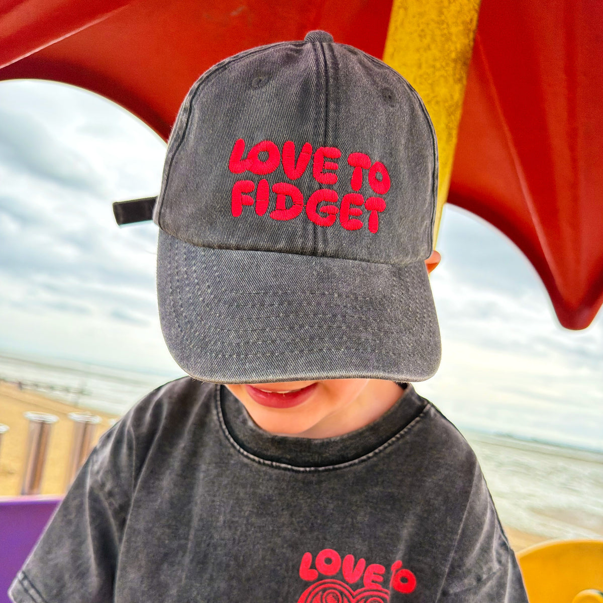 PRE-ORDER: Kids Washed Black Love To Fidget Cap